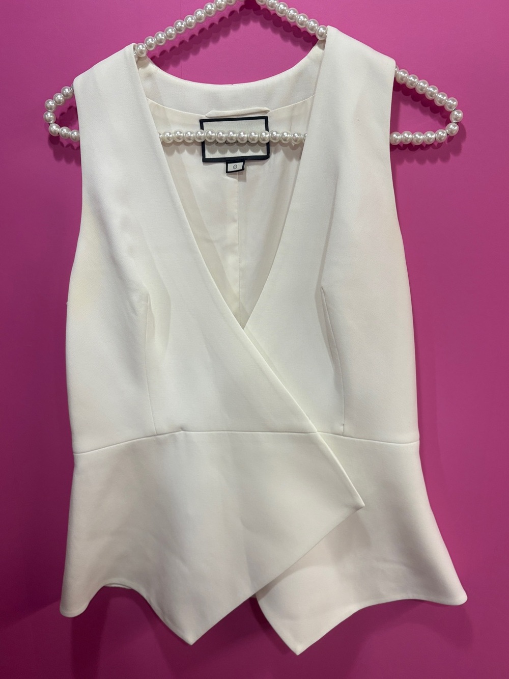 Alexis White V-Neck Peplum Vest Top